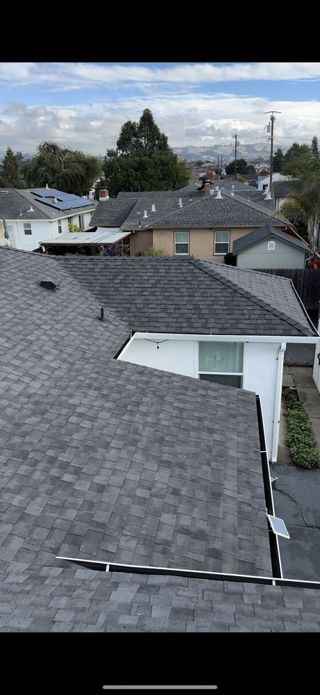 Slide of LAAC Roofing Services