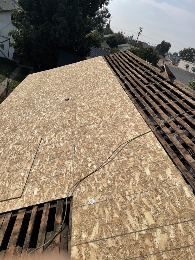 Slide of Oscar Roofing  services