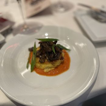 Ruth's Chris Steak House - Wild mushroom Ragu on a polenta cake with roasted red pepper pesto - Steakhouses Near Me - Newtown Square, Pennsylvania Ruth's Chris Steak House - Wild mushroom Ragu on a polenta cake with roasted red pepper pesto - Steakhouses Near Me - Newtown Square, Pennsylvania