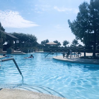 Robson Ranch - a pool with people in it - General Contractors Near Me - Denton, Texas