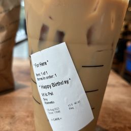 a cup of iced coffee with a price tag a cup of iced coffee with a price tag
