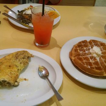 Wild Eggs - 4 egg omlete, waffle and tequila surise. - Breakfast & Brunch Near Me - Cincinnati, Ohio Wild Eggs - 4 egg omlete, waffle and tequila surise. - Breakfast & Brunch Near Me - Cincinnati, Ohio