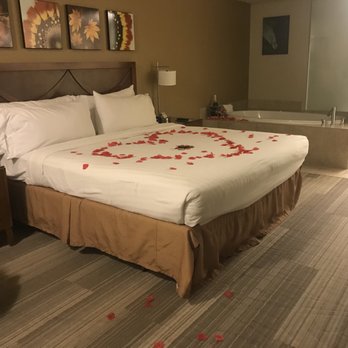 Holiday Inn Express Simi Valley - Flower petals on the floor and bed, nice! - Hotels Near Me - Simi Valley, California