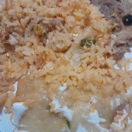 Chicken Chimichanga, rice & beans Chicken Chimichanga, rice & beans
