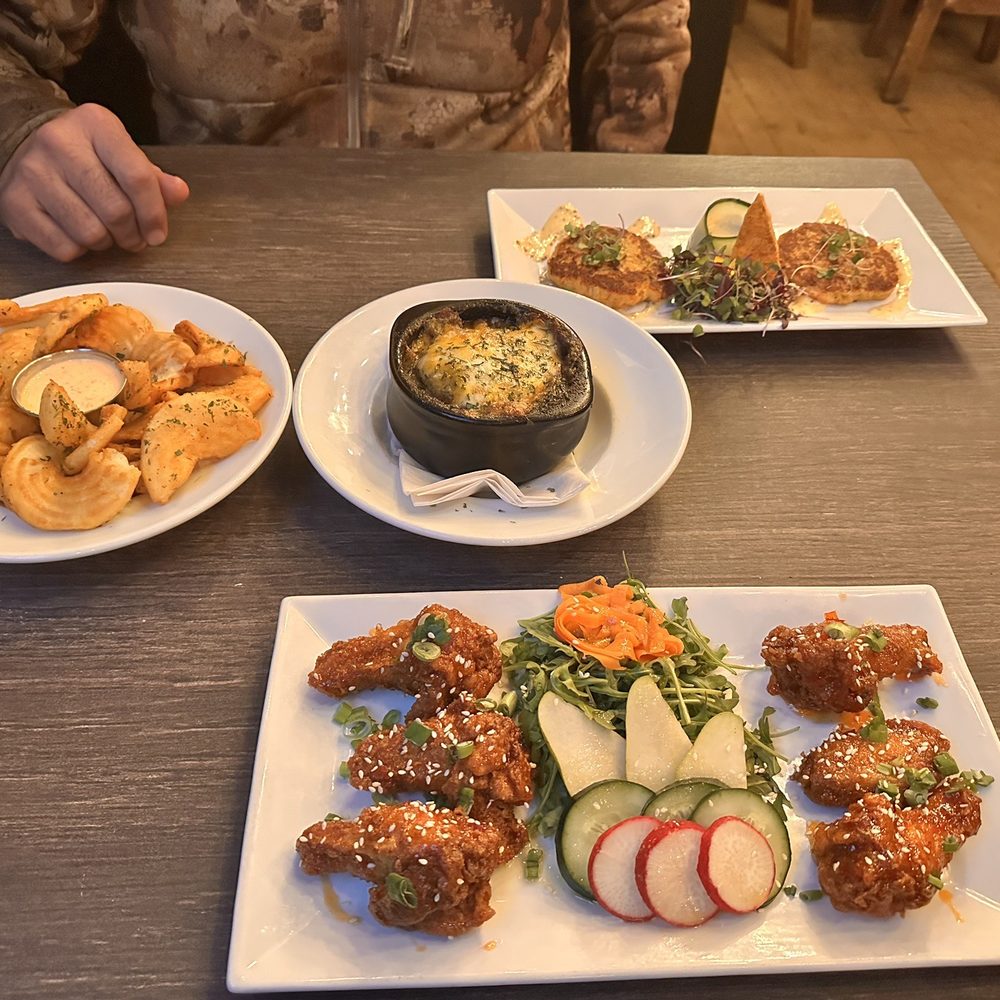 Chicken wings, shepherd pie, crab cakes with fries that have an amazing sauce. Chicken wings, shepherd pie, crab cakes with fries that have an amazing sauce.