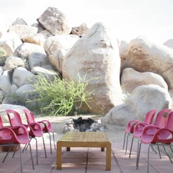 Villa dei Fiori - South terrace with stone fire pit, oak table and chairs.  Kitchen terrace table may be easily moved to the fire pit terrace.