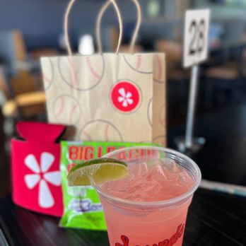 Third and Home - a drink in a plastic cup with a lime wedge - Sports Bars Near Me - Nashville, Tennessee Third and Home - a drink in a plastic cup with a lime wedge - Sports Bars Near Me - Nashville, Tennessee