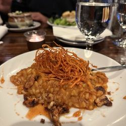 The Delaware Pub & Grill - Pumpkin Risotto Starter Pumpkin risotto, candied walnuts, smoked honey, and crispy sweet potato straws