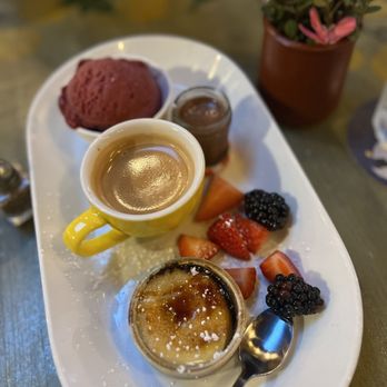 Anis Cafe & Bistro - Café Gourmand. Sampler of creme brûlée, chocolate mousse, and berry mint sorbet. With espresso. - French Near Me - Atlanta, Georgia Anis Cafe & Bistro - Café Gourmand. Sampler of creme brûlée, chocolate mousse, and berry mint sorbet. With espresso. - French Near Me - Atlanta, Georgia