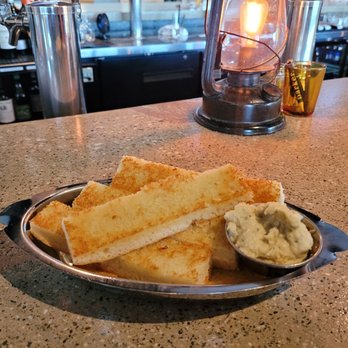 Parker. Eatery & Bar - a plate of toasted bread and dip - New American Near Me - Shelton, Connecticut Parker. Eatery & Bar - a plate of toasted bread and dip - New American Near Me - Shelton, Connecticut