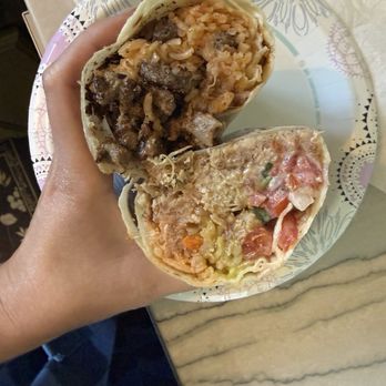 Dani's Taco Shop - Cross section on Conga Carne Asada Burrito and Carnitas Burrito. Both were great! Yummy! - Tacos Near Me - Bend, Oregon