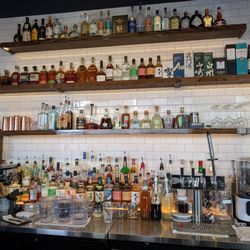 Meshikou - Bar, bar area. Adjacent to the main dining area. A well curated selection of liquors and spirits!