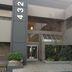 Pts Travel - Entrance is further in the parking lot