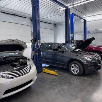 Conner's Car Care - Interior of Conners Car Care Fort Branch IN showing vehicles on lifts for auto repair, diagnostics, and maintenance services - Auto Repair Near Me - Fort Branch, Indiana Conner's Car Care - Interior of Conners Car Care Fort Branch IN showing vehicles on lifts for auto repair, diagnostics, and maintenance services - Auto Repair Near Me - Fort Branch, Indiana