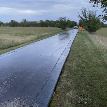CW Asphalt Paving - CRS two oil performed over concrete driveway before applying 3/8 chip rock - Masonry/Concrete Near Me CW Asphalt Paving - CRS two oil performed over concrete driveway before applying 3/8 chip rock - Masonry/Concrete Near Me