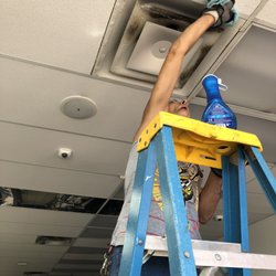 AirMax Duct Cleaning - External vent cover cleaning in process