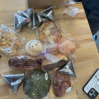 Clover Bakery & Cafe - assortment of breads and onigiri - Bakeries Near Me - San Jose, California