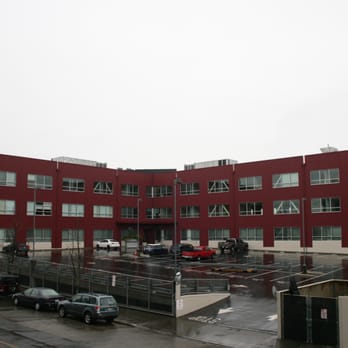 Wheeler Painting - a large red building with a lot of windows - Painters Near Me - Kent, Washington Wheeler Painting - a large red building with a lot of windows - Painters Near Me - Kent, Washington
