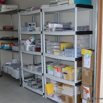 Simple Organized Solutions - After - garage (marketing supplies are sorted for easily retrieval for meetings). - Home Organization Near Me