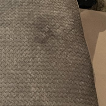Ashley Store - Oil stain - Furniture Stores Near Me - Pflugerville, Texas