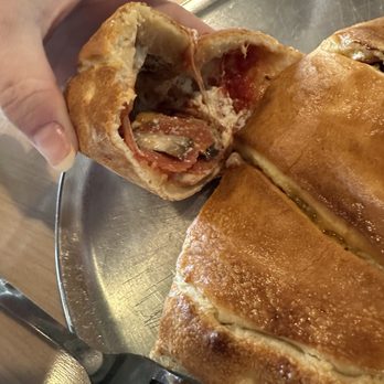 Village Pizza - Inside my calzone. I added pepperoni and mushrooms p - Pizza Near Me - Albuquerque, New Mexico