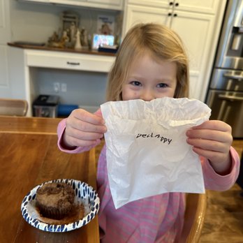 Inclusion Coffee - Employee wrote Be Happy on her muffin package :) - Coffee & Tea Near Me - Arlington, Texas