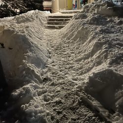 Vacasa - McCall - Walkway to the front door, before & after we shoveled it.