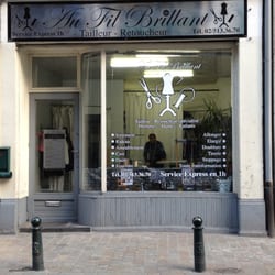 Au Fil Brillant - vitrine du magasin de retouche  Au fil brillant
