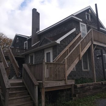L S Construction - a house with stairs leading up to it - Flooring Near Me L S Construction - a house with stairs leading up to it - Flooring Near Me
