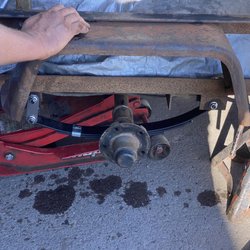 Alex's Radiator & Auto Repair - New spring installed.