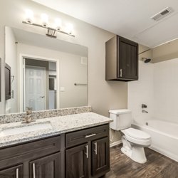 Riverhill Apartments - Bathroom at Riverhill Apartments in Grand Prairie, Texas