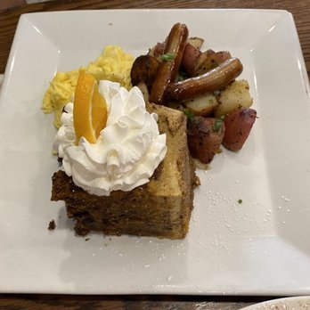 Bella's Cafe - Baked Harvest French Toast (Pumpkin chocolate chip & walnut cake soaked in our spiced pumpkin custard with two eggs and other sides) - Breakfast & Brunch Near Me - New Haven, Connecticut