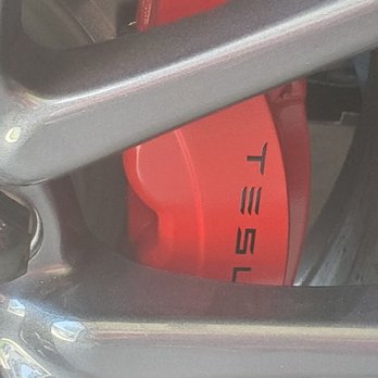 Baid Polish - Front Calipers painted red with black accent writing - Powder Coating Near Me - Anaheim, California Baid Polish - Front Calipers painted red with black accent writing - Powder Coating Near Me - Anaheim, California