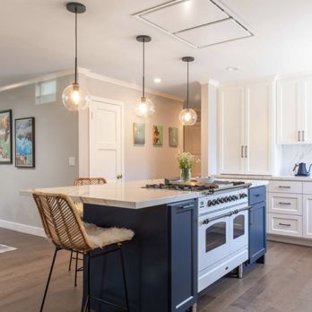 Bay Area Floors & Design Carpet One - a kitchen with a large island - Flooring Near Me - San Mateo, California Bay Area Floors & Design Carpet One - a kitchen with a large island - Flooring Near Me - San Mateo, California
