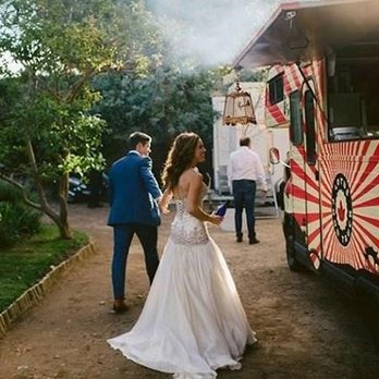 Trucked Up Catering - a bride and groom getting ready to eat - Food Trucks Near Me - Highland Park, Illinois Trucked Up Catering - a bride and groom getting ready to eat - Food Trucks Near Me - Highland Park, Illinois
