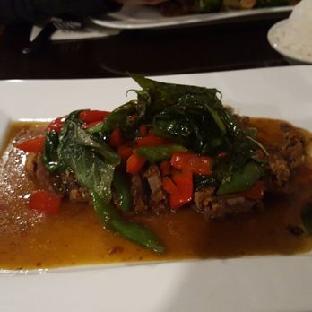 Silk Thai Restaurant - Silk Crispy Duck is a crispy duck stir-fried with spicy basil sauce. - Thai Near Me - Charlottesville, Virginia Silk Thai Restaurant - Silk Crispy Duck is a crispy duck stir-fried with spicy basil sauce. - Thai Near Me - Charlottesville, Virginia