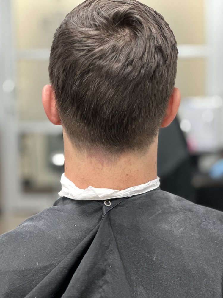 Shave The Mane Logo
