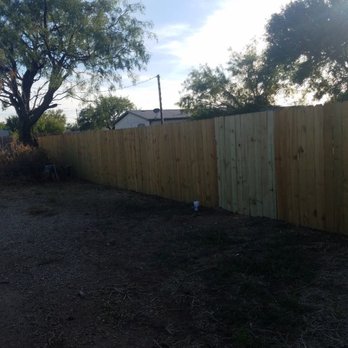 Wolf Roofing and General Contracting - a wooden fence - Roofing Near Me Wolf Roofing and General Contracting - a wooden fence - Roofing Near Me