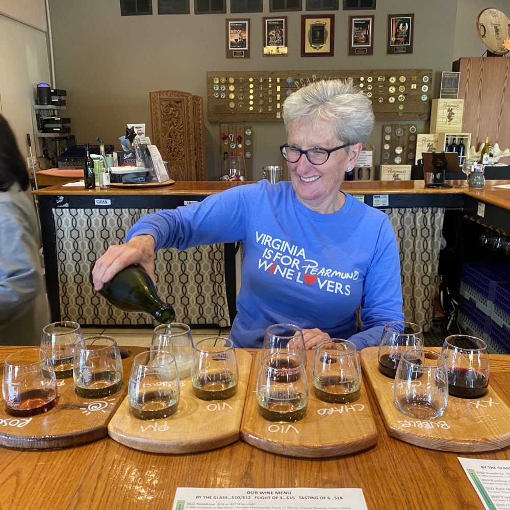 Pearmund Cellars - Friendly staff pouring the flight orders. - Wineries Near Me - Broad Run, Virginia Pearmund Cellars - Friendly staff pouring the flight orders. - Wineries Near Me - Broad Run, Virginia