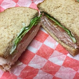 Build Your Own Sandwich: freshly carved turkey sandwich with lettuce, tomato and mayo on wheat Build Your Own Sandwich: freshly carved turkey sandwich with lettuce, tomato and mayo on wheat