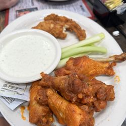 JJ's Grill - Happy hour wings and chicken fingers plate delicious with perfect amount of sauce and great size, not the tiny little ones.