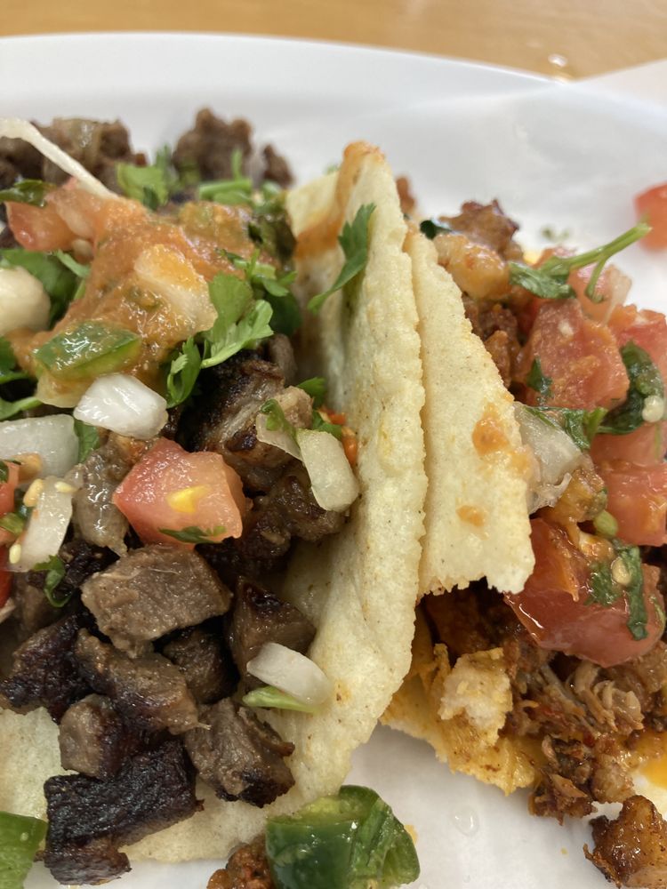 Taqueria Rancho El Milagro Logo