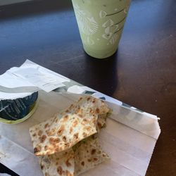 Starbucks - Venti Iced Matcha Latte with oat milk and light ice and a Spicy Falafel Pocket with Avocado Spread