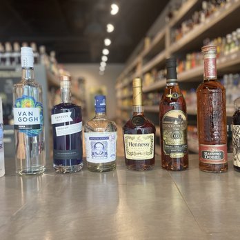 Dunes Liquor - a variety of liquor bottles on a counter - Beer, Wine & Spirits Near Me - Myrtle Beach, South Carolina Dunes Liquor - a variety of liquor bottles on a counter - Beer, Wine & Spirits Near Me - Myrtle Beach, South Carolina