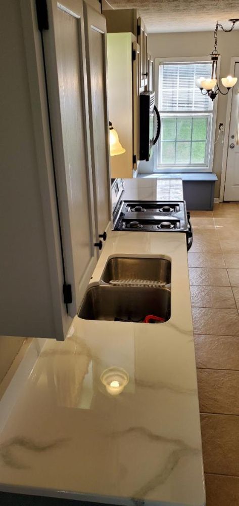 Slide of C&C Roofing and Restorations