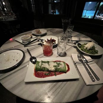 Battalion - The slow roasted carrots, bread service with roasted garlic olive oil, pesto pasta, and the delicious manicotto di spinaci (center) - Italian Near Me - San Antonio, Texas