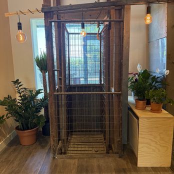 Olomana Studios - 200 year old elevator as you walk in. So much character! - Art Classes Near Me - Irvine, California