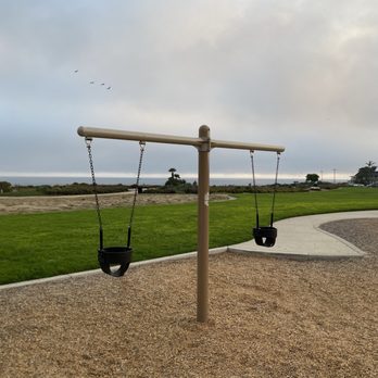 Dinosaur Caves Park - Toddler swings. - Parks Near Me - Pismo Beach, California