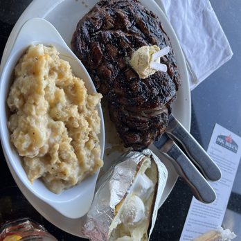 Big Mike's Steakhouse - Big Mike Steak with baked potato and mashed potatoes. - Steakhouses Near Me - Guntersville, Alabama Big Mike's Steakhouse - Big Mike Steak with baked potato and mashed potatoes. - Steakhouses Near Me - Guntersville, Alabama