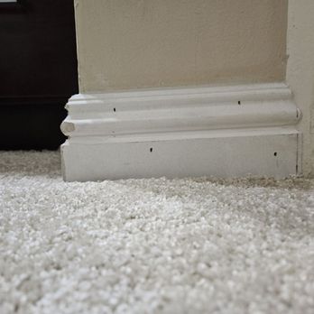 New York Carpets & Flooring - Crooked baseboard with exposed nail holes - Carpeting Near Me - Anaheim, California New York Carpets & Flooring - Crooked baseboard with exposed nail holes - Carpeting Near Me - Anaheim, California